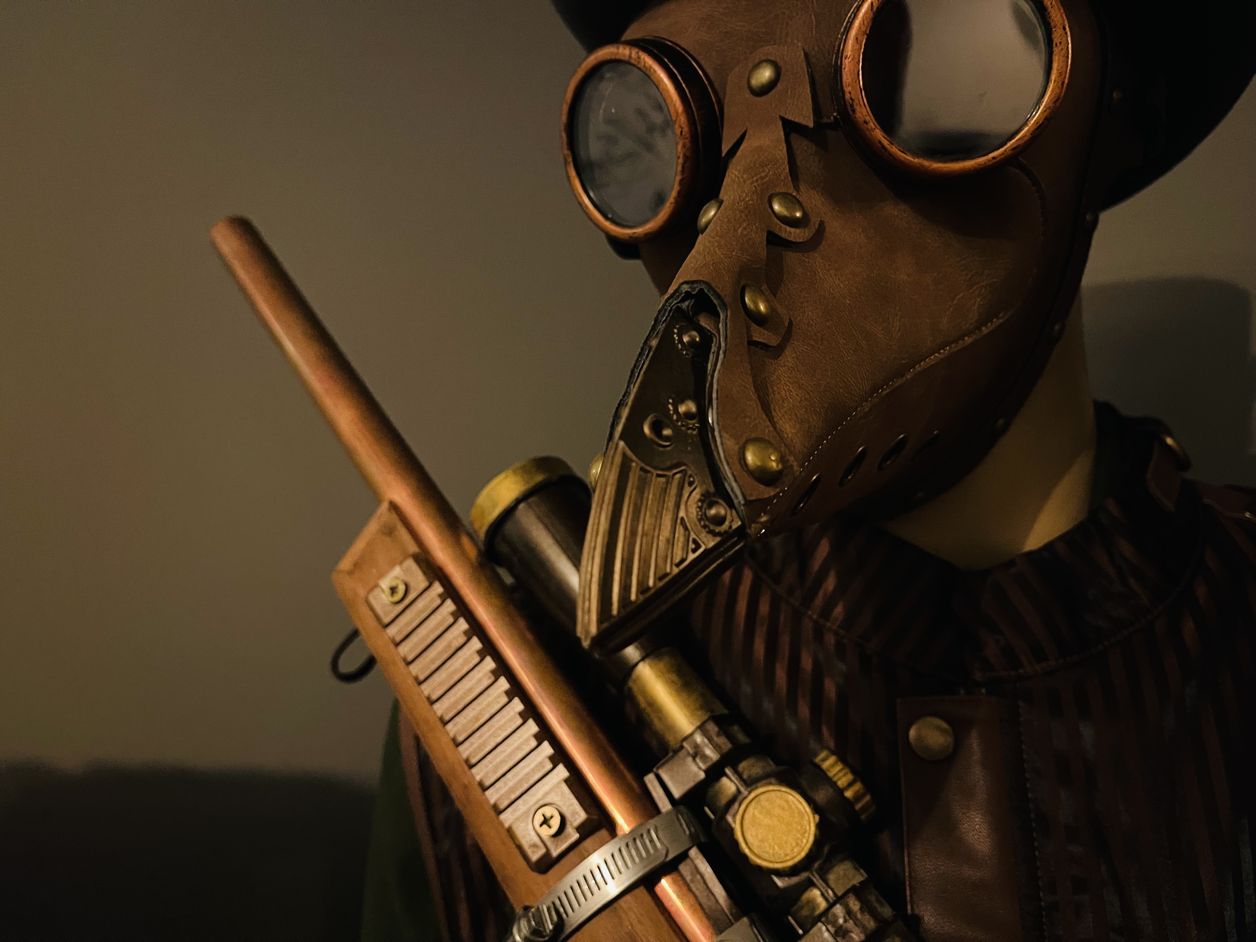 Clockwork Corridor plauge masked figure holding rifle